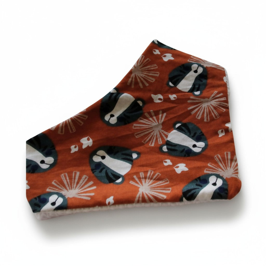 Bavoir panthères bleu pétrole