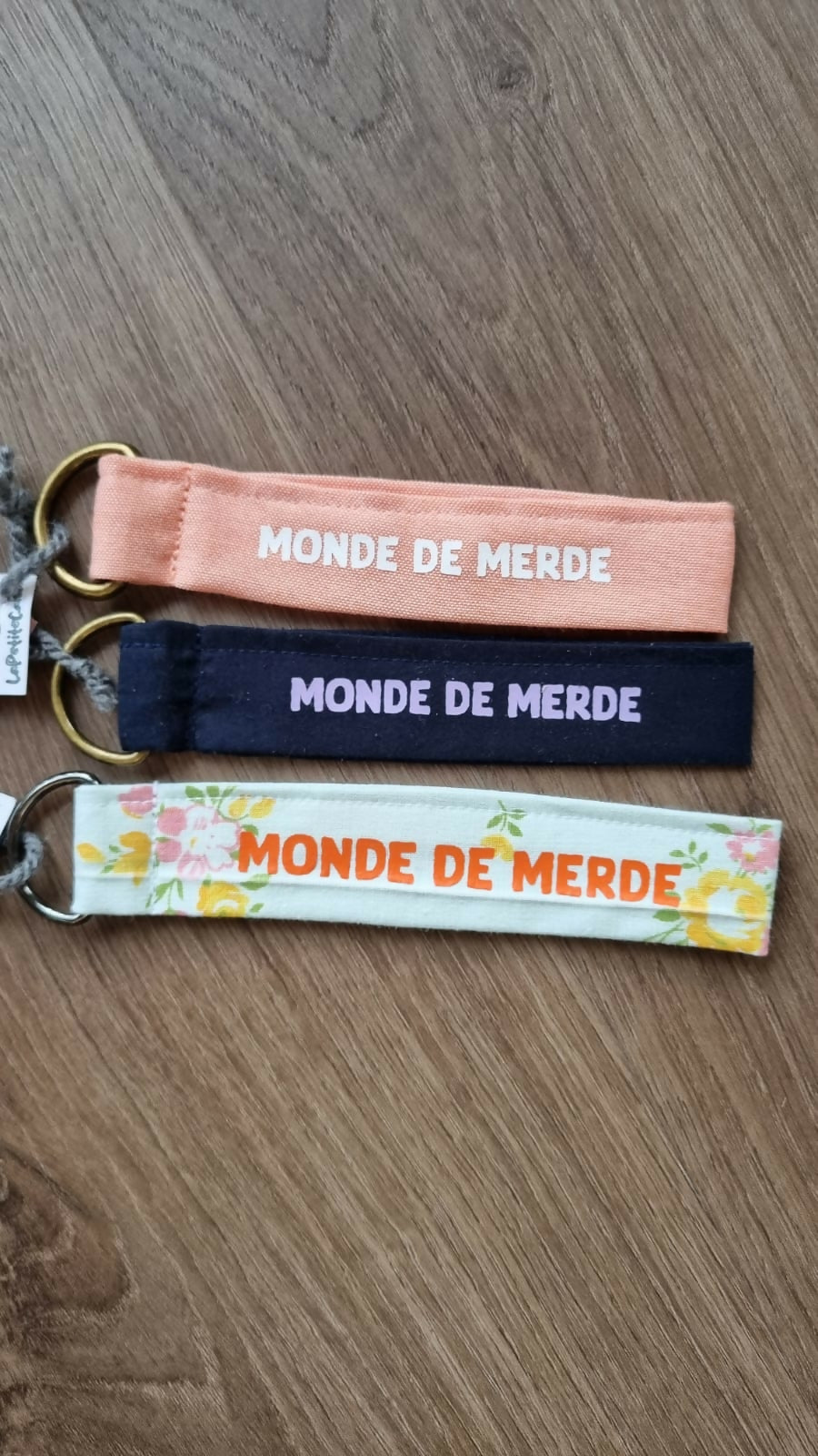 Porte-clé "Monde de merde"