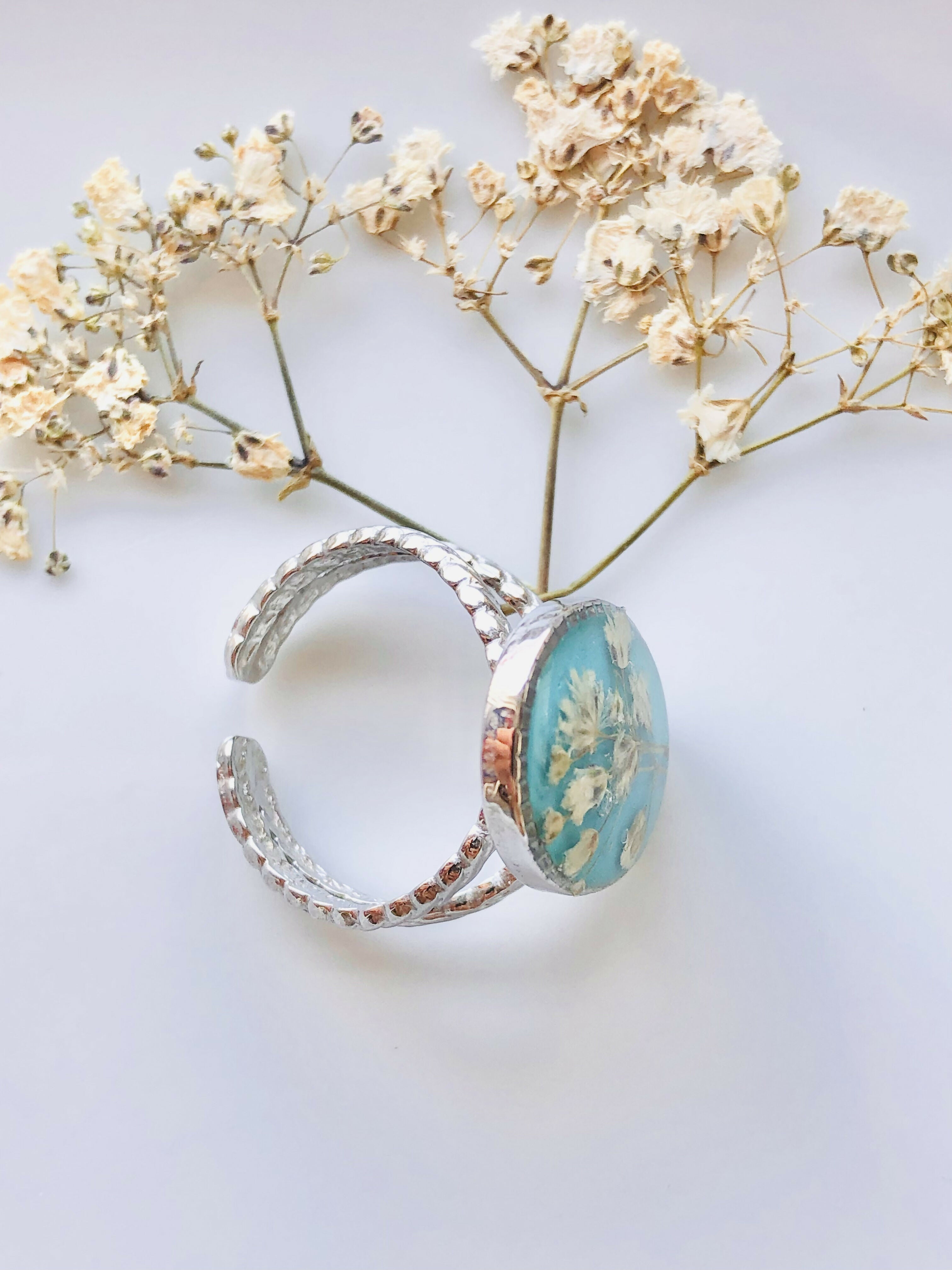 Bague turquoise et fleur de bonheur blanche