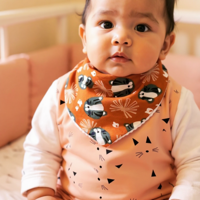 Bavoir panthères bleu pétrole