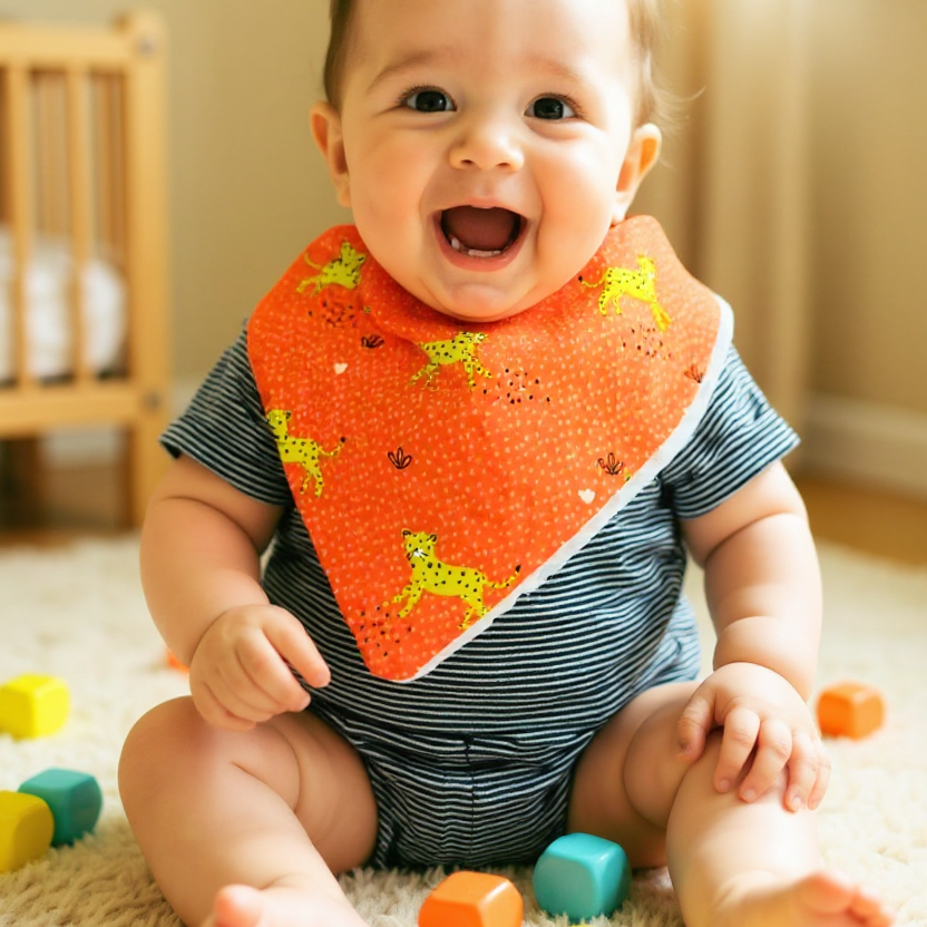 Bavoir léopard orange vif